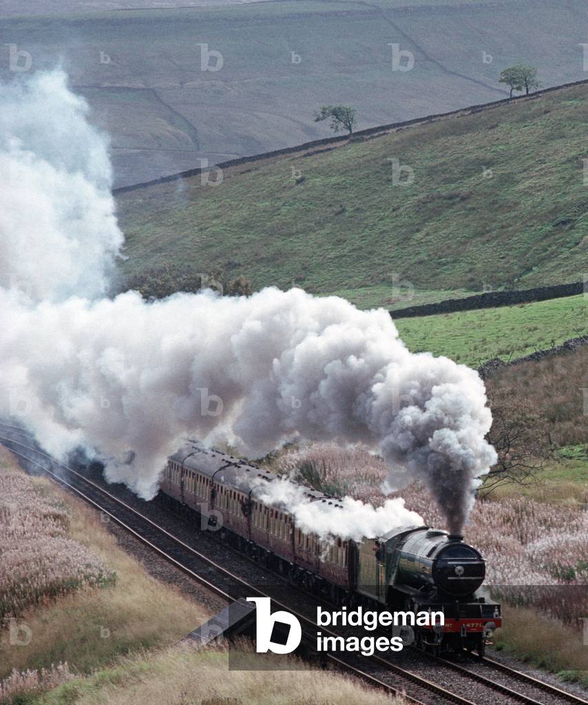 Green Arrow LNER steam locomotive on the Settle to Carlisle railway line, Northern England, 1992 (photograph)