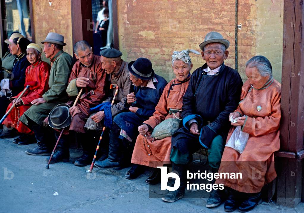 Senior citizen Mongolians in Ulan Bator Buddhist Temple, Ulan Bator, Mongolia, Asia