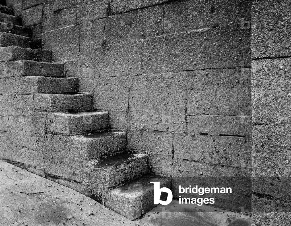 Stone harbour steps, Galway Bay, Ireland (b/w photo)