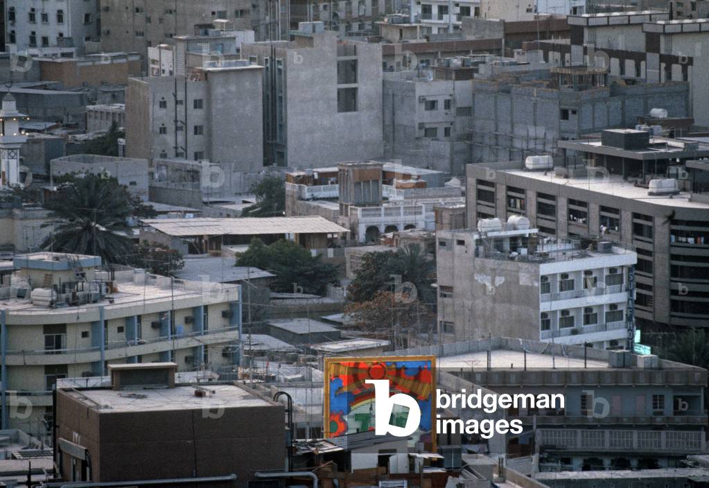 1980s Downtown Dubai with 7UP drink neon advertising hoarding, United Arab Emirates, UAE