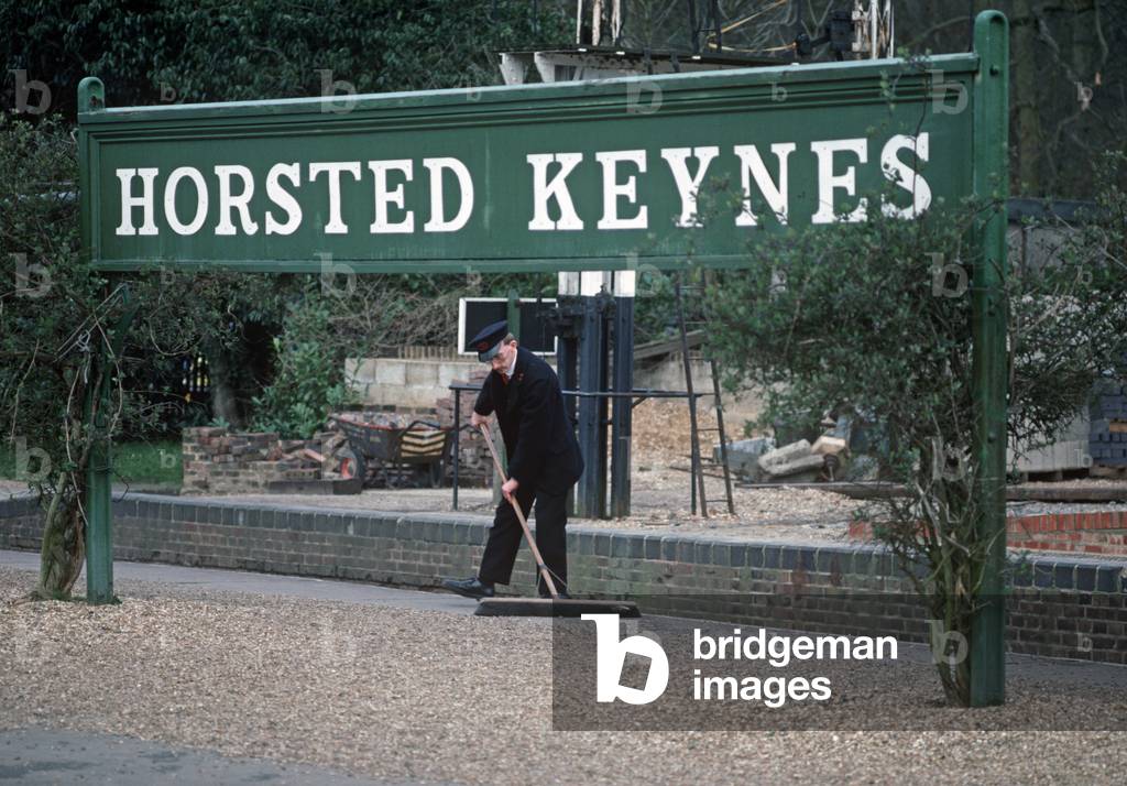 Sweeping platform at Horsted Keynes Railway Heritage Railway, West Sussex, England, UK, 1990 (photo)