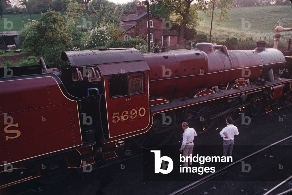London Midland and Scottish (LMS) Jubilee Class steam locomotive 5690 at Bridgenorth locomotive sheds on the Severn Valley Hertage Railway, Shropshire & Worcester, England, UK, 1989 (photo)