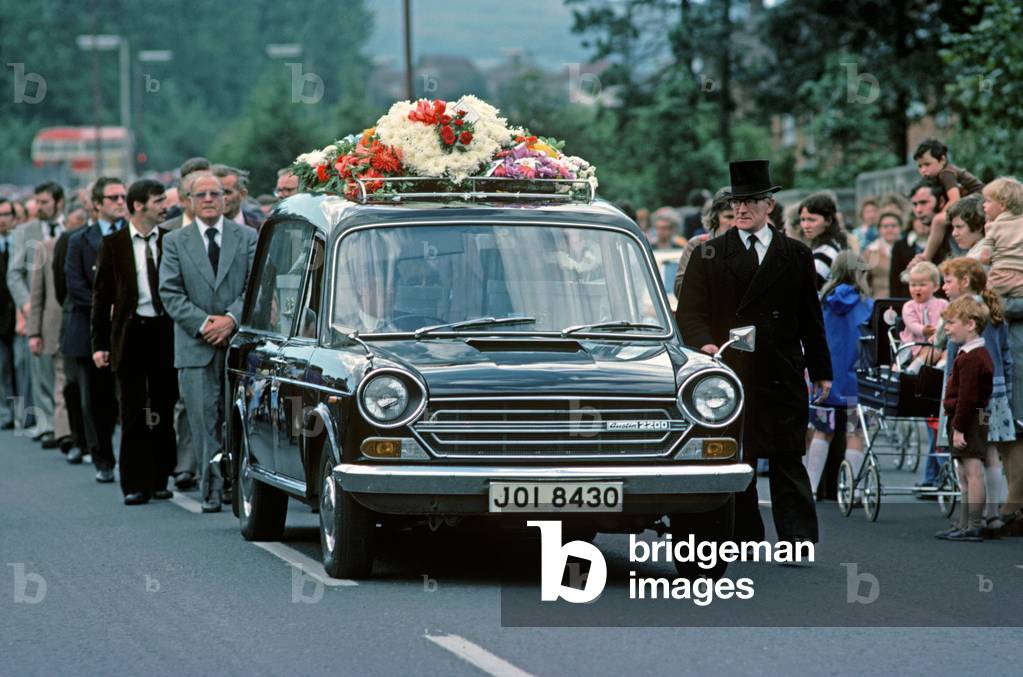 Maguire Family Funeral of 3 Children killed when a car driven by an IRA volunteer Danny Lennon ploughed into them after having been shot by the British Army, Northern Ireland, 1976 (photo)