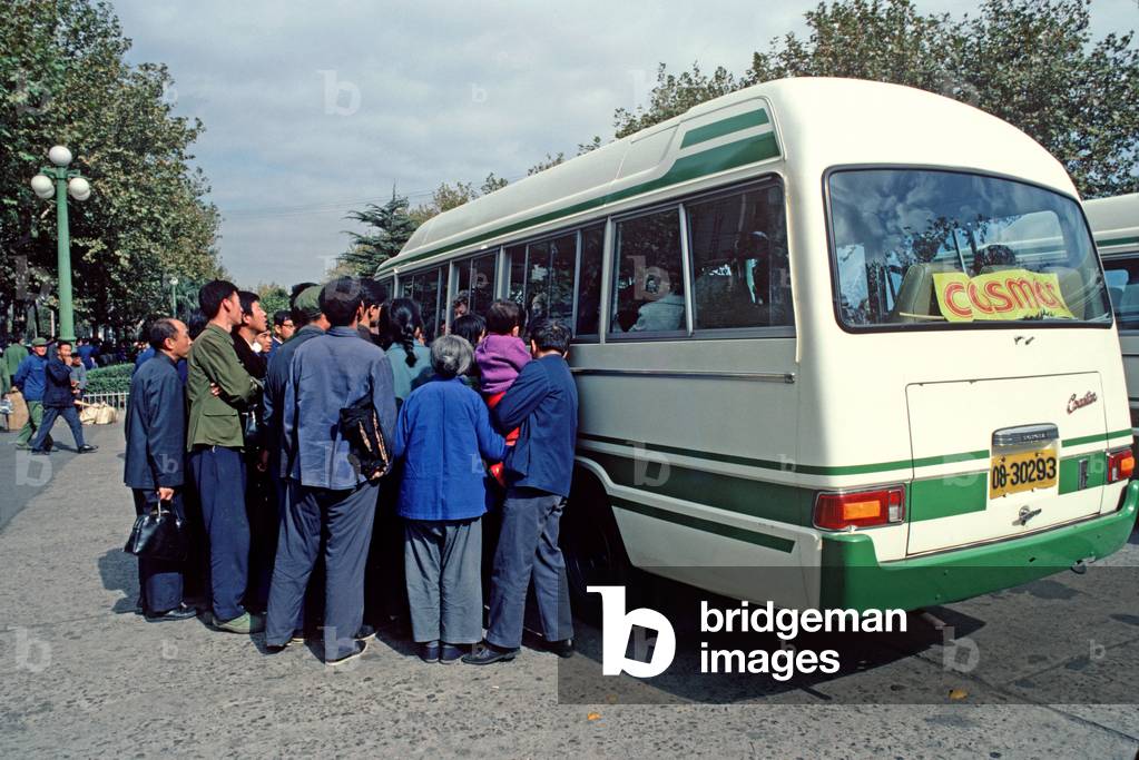 Crowd around Tourist bus, Shanghai, China, 1979 (photo)