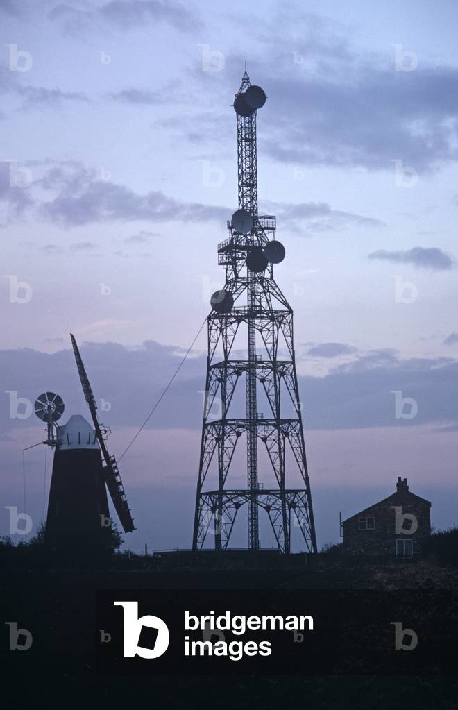British Telecom microwave tower also used by the military and civil defense. Designed in the 50s, Cambridgeshire, UK (photo)