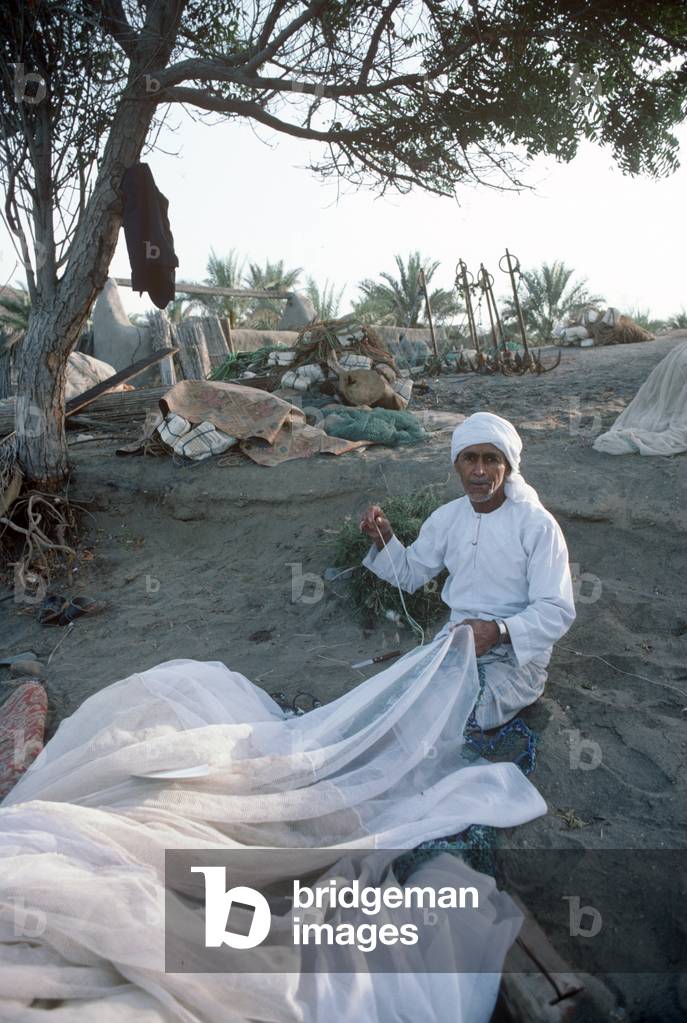 stowing and repairing fishing nets, Sharjah, United Arab Emirates