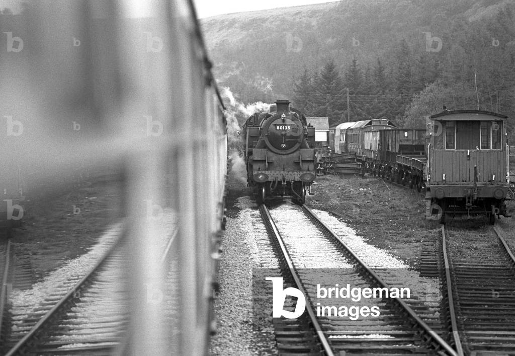 Steam trains on passing loop on the North Yorkshire Moors Railway, North Yorkshire, England, UK, 1992 (b/w photo)