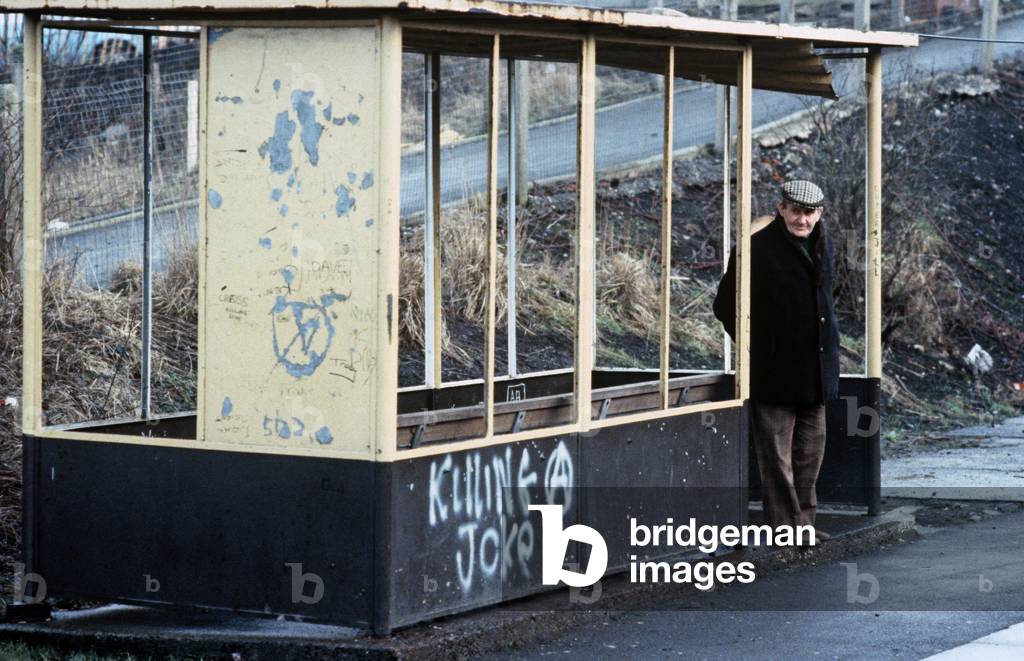 Passenger at Hapton railway station on the British Rail Preston to Colne railway line, Lancashire, Great Britain, 1982 (photograph)