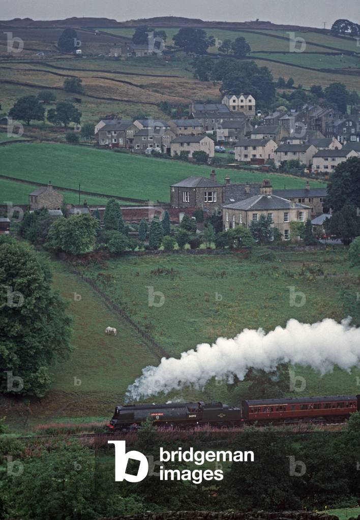 Steam train in the Worth Valley on the heritage Keighley and Worth Valley Heritage Railway line, West Yorkshire, England, UK, 1989 (photo)