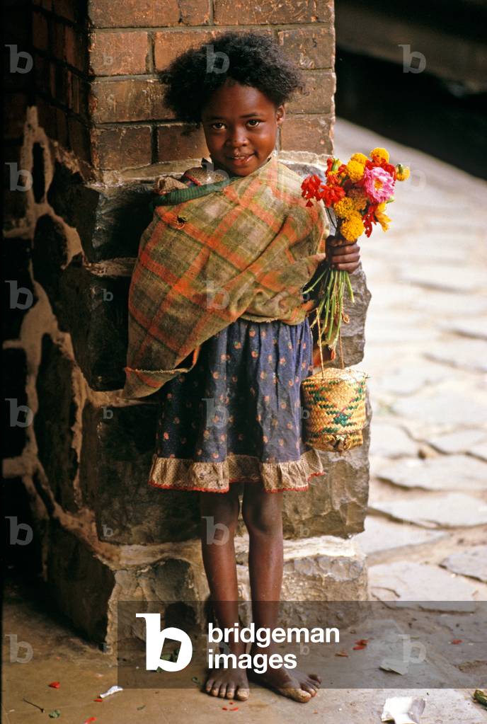 Flower girl at Perinet railway station, Madagascar, East Africa, Africa, 1980s (photo)