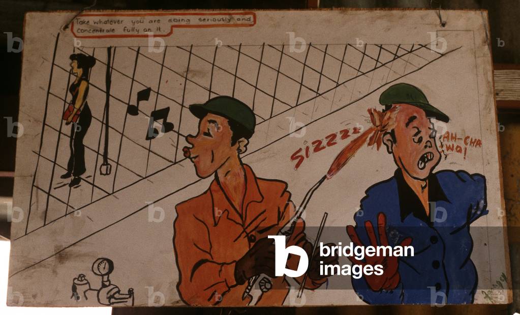 safety posters in Geddu plywood factory, Geddu, Bhutan, Himalayas (photo)