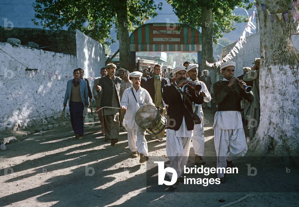Pipes and drums leading in polo players into the Agha Khan Shani Polo Stadium in Gilgit, Gilgit-Baltistan Administrative Area, Pakistan (photo)