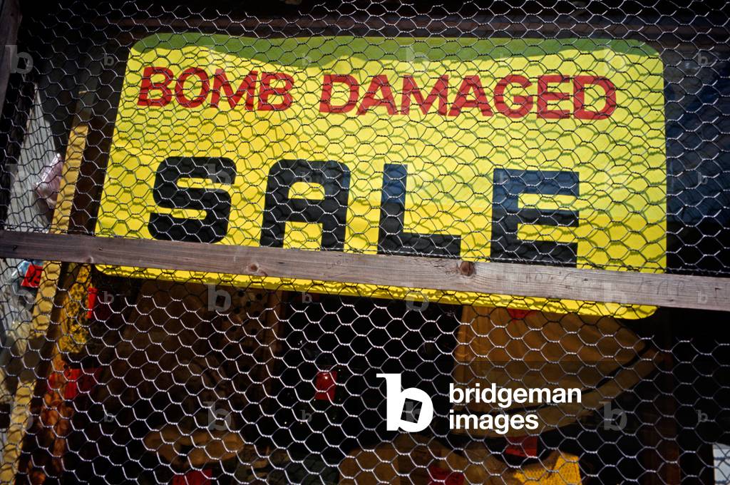 Bomb Damage Sale sign on Belfast Shop during The Troubles, Northern Ireland, 1972 (photo)