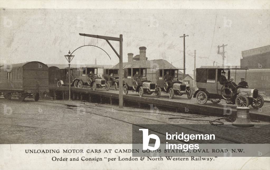 Unloading motor cars at Camden Goods Station, Oval Road, NW (b/w photo)
