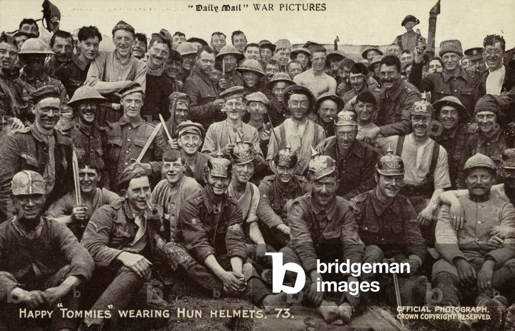 British soldiers wearing captured German helmets, Battle of the Somme, World War I, 1916 (b/w photo)