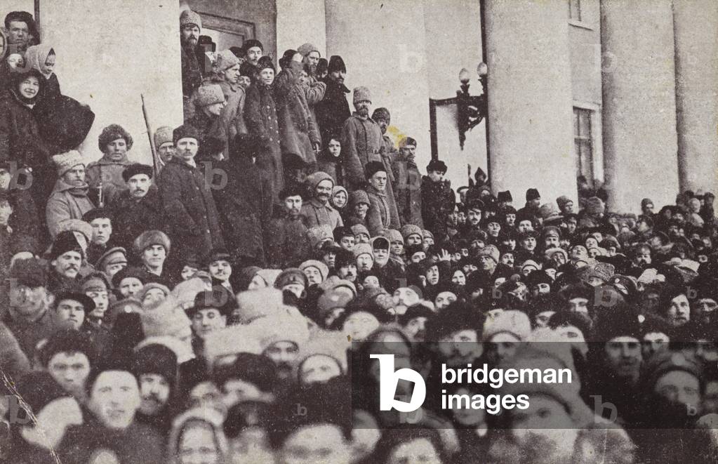 People gathered outside a building during the February Revolution, Petrograd, Russia, 1917 (b/w photo)