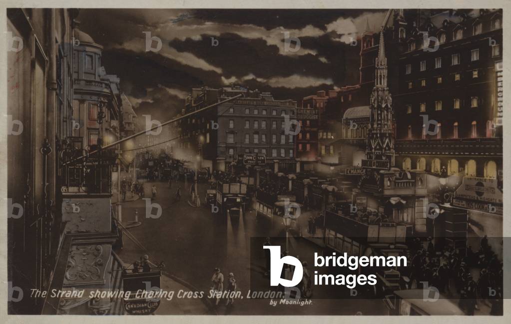 The Strand, showing Charing Cross Station, London, by moonlight (colour litho)