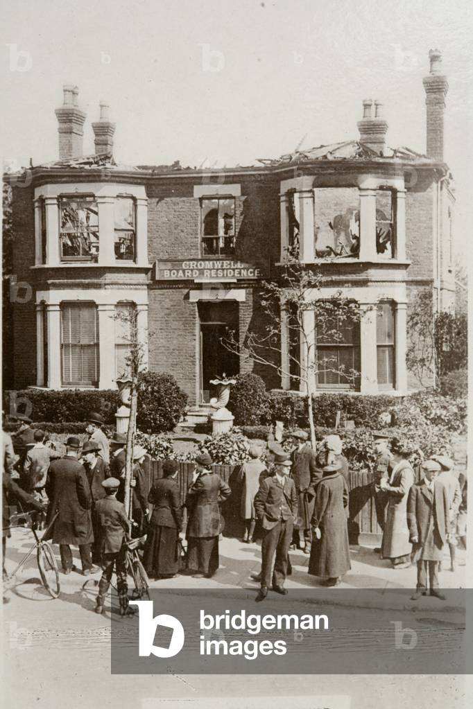 Boarding house on Cromwell Road damaged in a Zeppelin raid on Southend, Essex, 10 May 1915 (b/w photo)