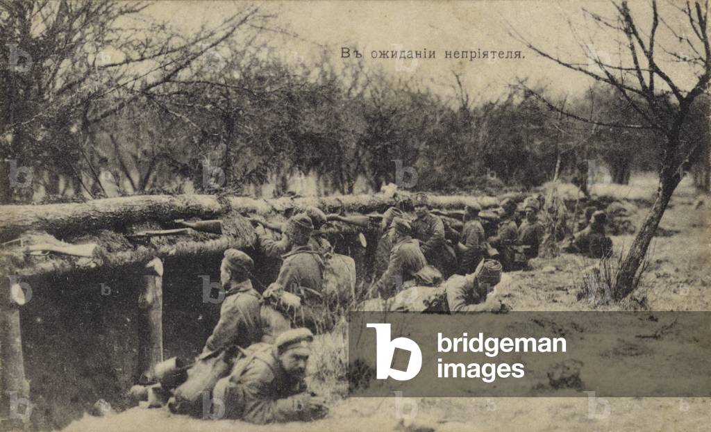 Russian soldiers in a trench, waiting for the enemy, early 20th Century (b/w photo)