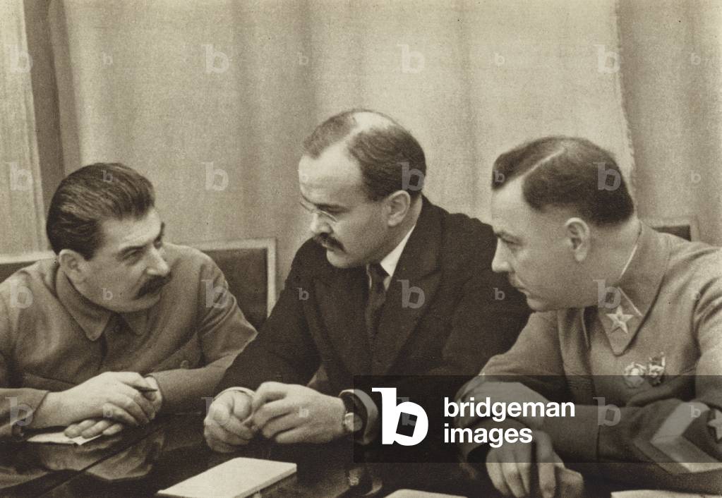 Soviet leaders Joseph Stalin, Vyacheslav Molotov and Kliment Voroshilov at a meeting of agricultural workers, 1935 (b/w photo)