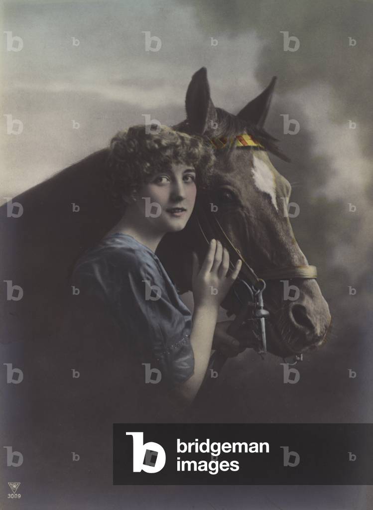 Portrait of a girl with a horse (coloured photo)