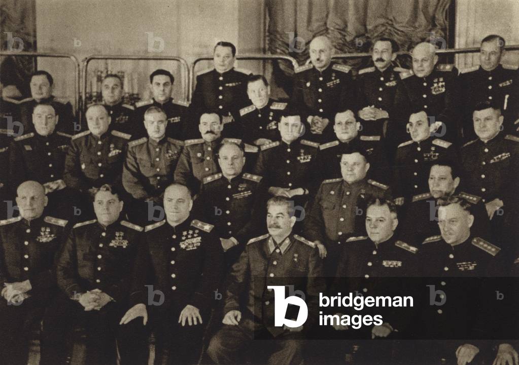 Generalissimo Joseph Stalin with a group of marshals, generals and admirals, deputies in the Supreme Soviet of the USSR, 1945 (b/w photo)