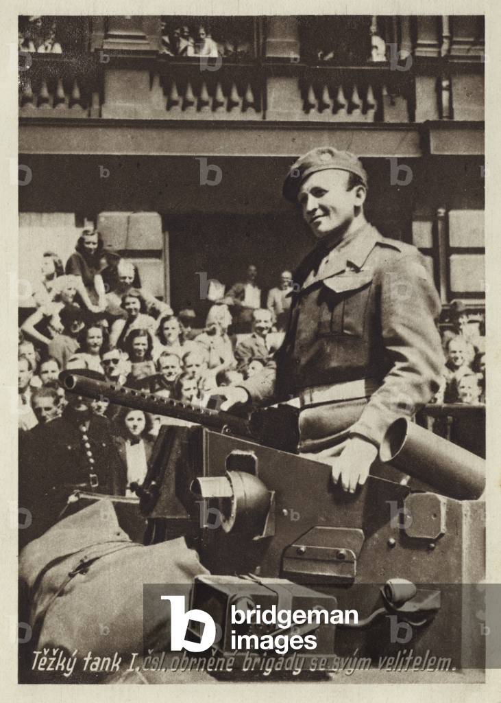 Heavy tank of the Czechoslovak 1st Armoured Brigade and its commander parading through Prague after the end of the German occupation in 1945 (b/w photo)