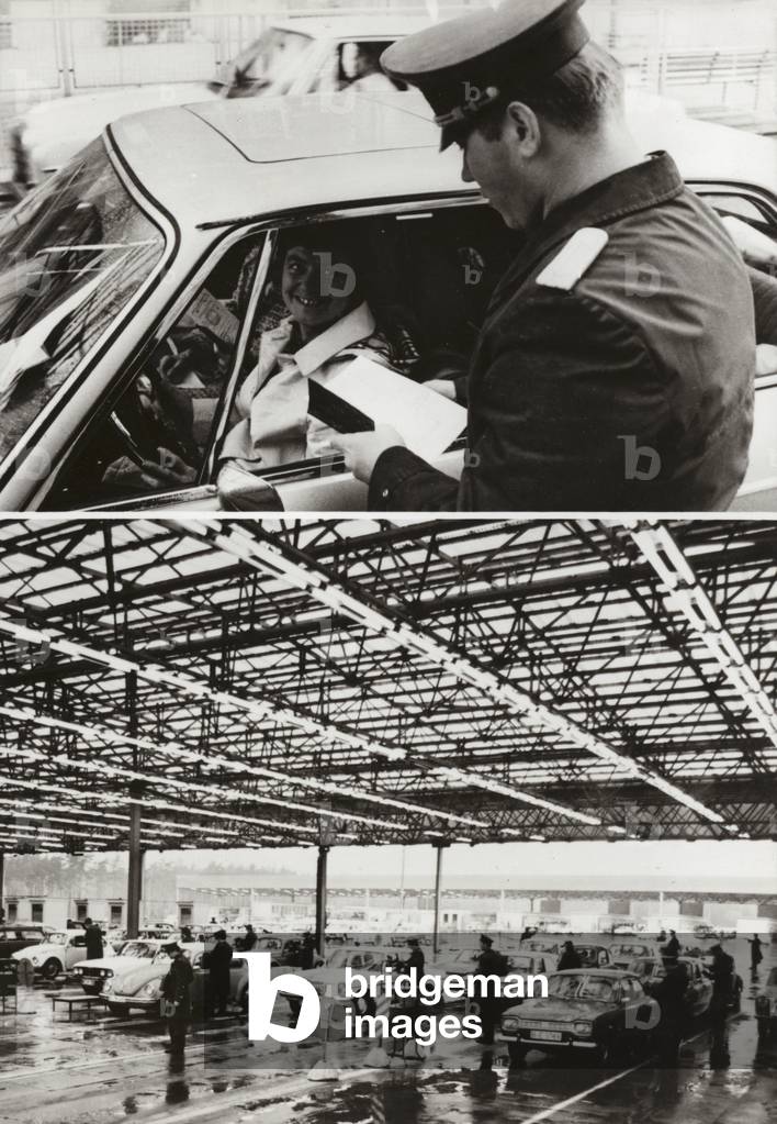 The frontier crossing traffic at the border crossing points between the capital of the German Democratic Republic, Berlin, and West Berlin .... (b/w photo)