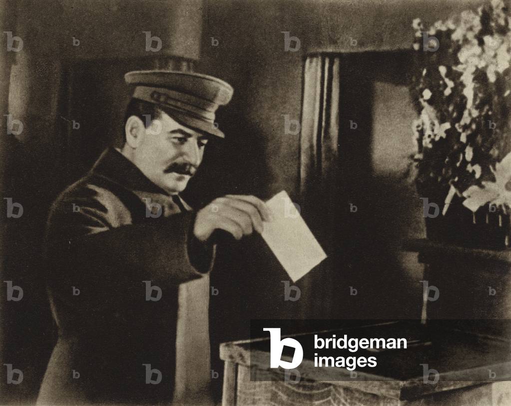 Soviet leader Joseph Stalin voting in his electoral district in the 1937 elections to the Supreme Soviet of the USSR (b/w photo)