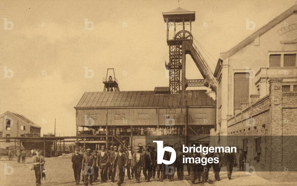 Coal miners leaving a pit (b/w photo)