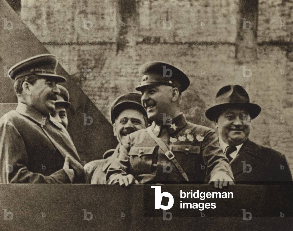 Soviet leaders Joseph Stalin and Kliment Voroshilov with Bulgarian Communist Georgi Dimitrov, leader of Comintern, at the May Day celebrations, Moscow, 1937 (b/w photo)