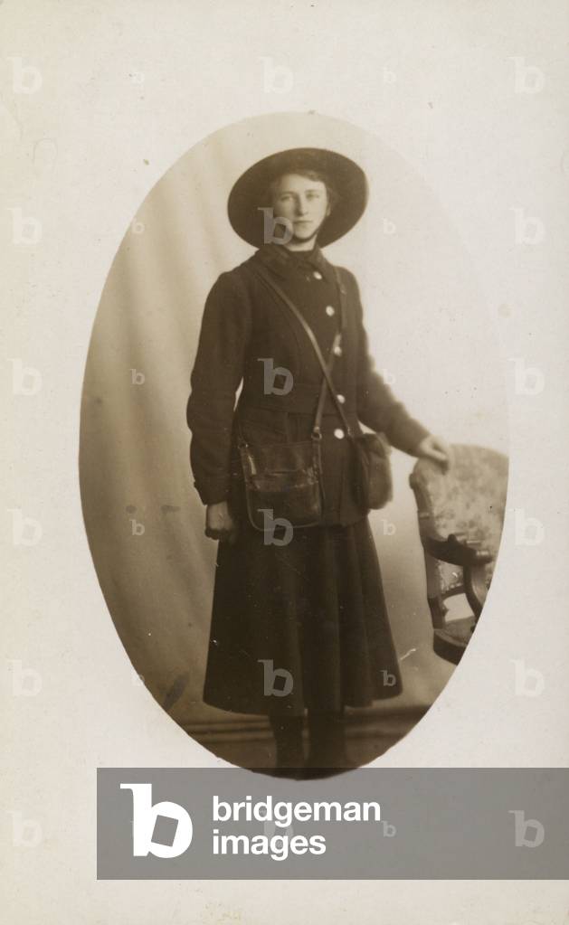Bus conductress, World War I (b/w photo)