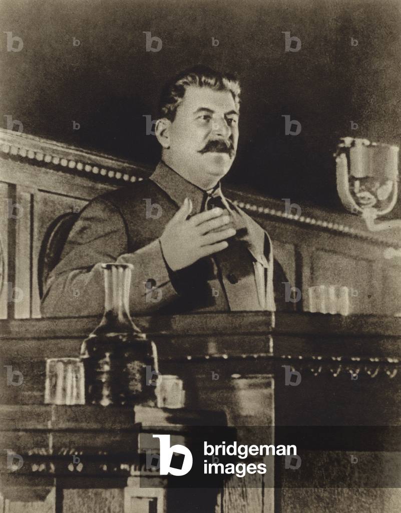 Soviet leader Joseph Stalin speaking in front of the All-Union congress of the Stakhanovism movement, 1935 (b/w photo)