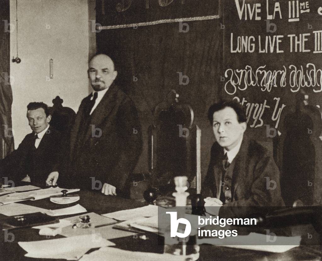 Lenin in the presidium of the First Congress of the Communist International in the Kremlin, Left to right, H Eberlein, Lenin and F Platten, Moscow, 2-6 March 1919 (b/w photo)