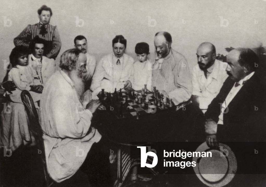 L N Tolstoi playing chess with M S Suchotin, Yasnaya Poliana, 1908 (b/w photo)