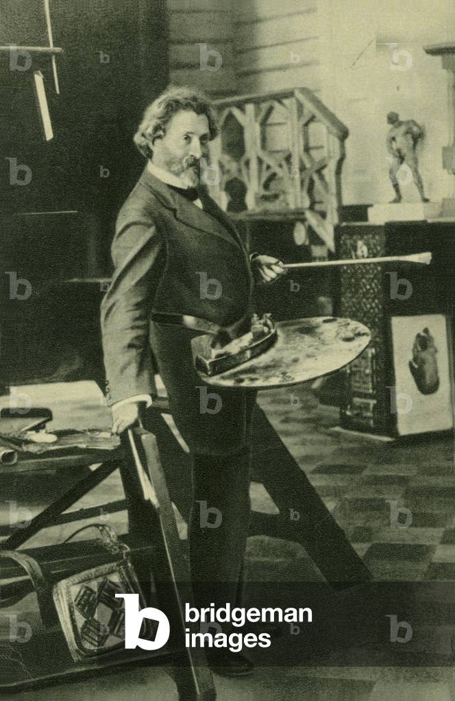 Russian painter Ilya Repin at work in his studio, early 20th Century (b/w photo)