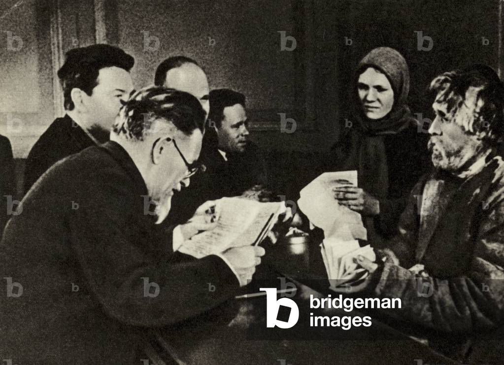 Soviet statesman Mikhail Kalinin receiving visitors at his office, 1939 (b/w photo)