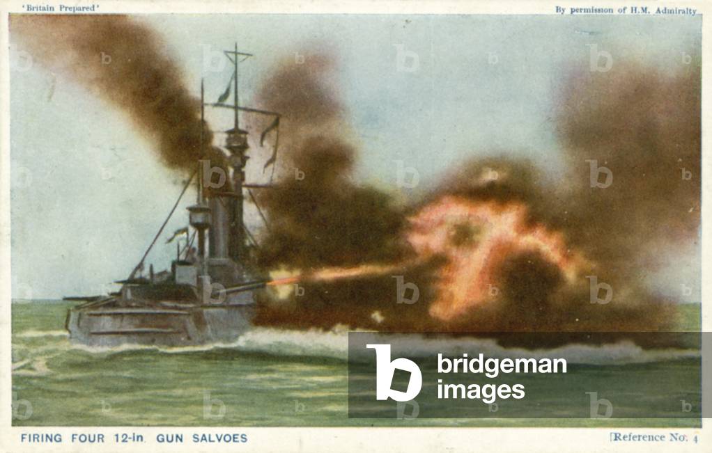 Artillery gun firing on battleship (colour photo)