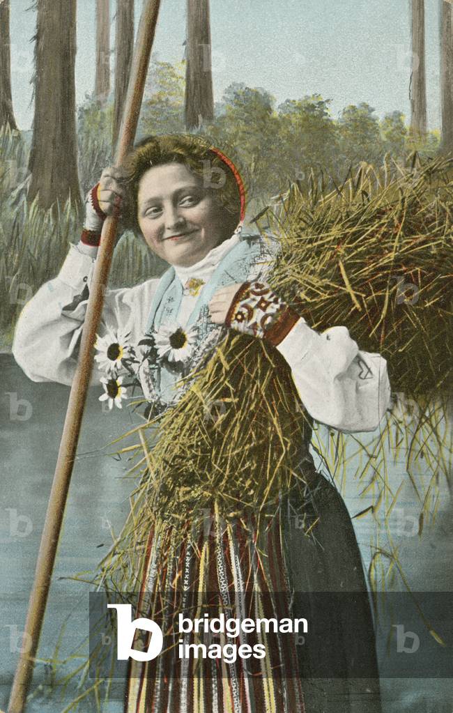 Norwegian girl during harvest (colour photo)