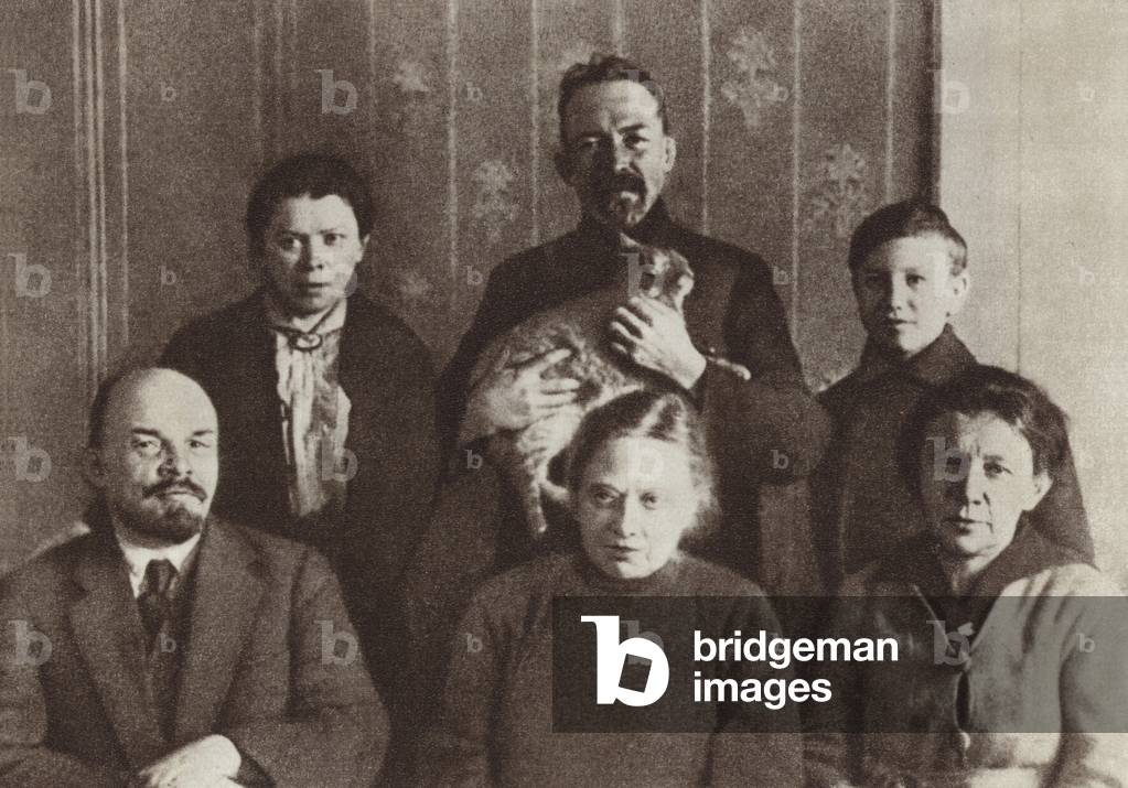Lenin and N K Krupskaya with A I Yelizarova, M I Ulyanova, D I Ulyanov and G Y Lozgachov in Lenin's flat in the Kremlin, Moscow, autumn of 1920 (b/w photo)
