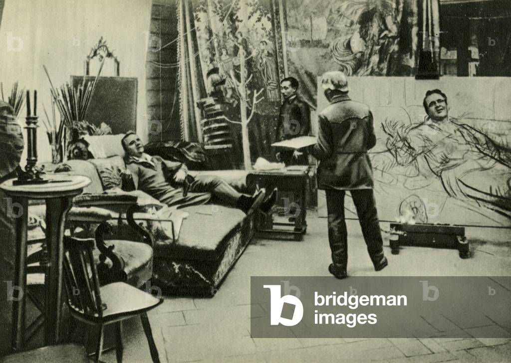 Ilya Repin painting a portrait of Russian opera singer Feodor Chaliapin, February 1914 (b/w photo)