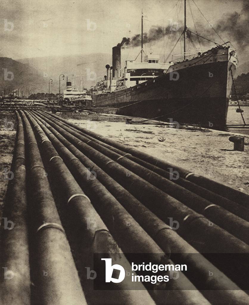 Foreign oil tankers at the port of Batumi on the Black Sea, waiting to be filled with Soviet oil, USSR, 1931 (b/w photo)