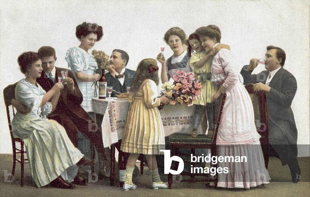 Family at dinner (colour photo)