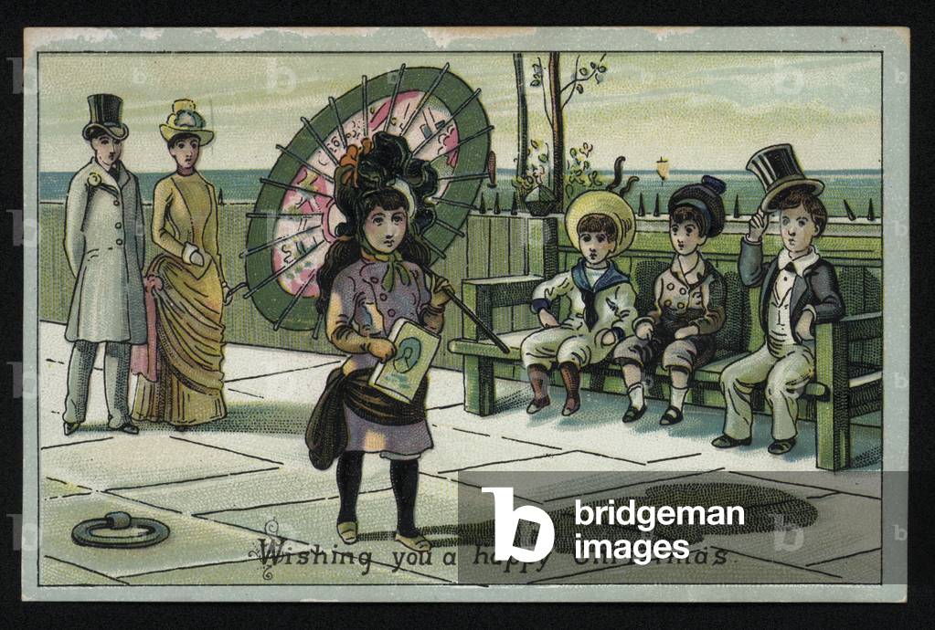 Girl with a large parasol walking along a seaside promenade, Christmas greetings card. (chromolitho)