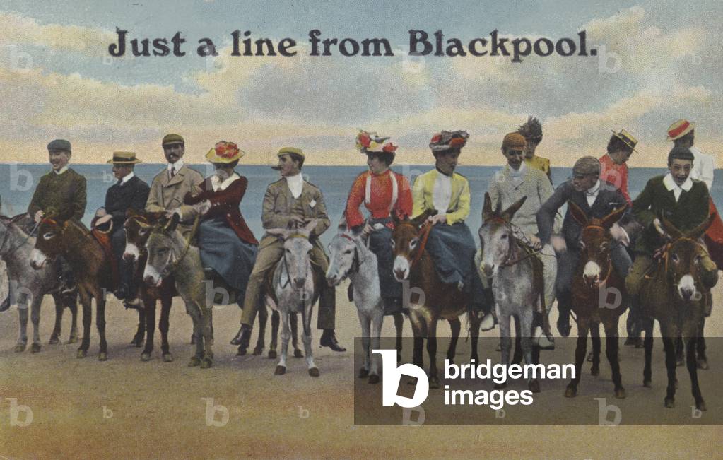 Row of people on donkeys at Blackpool beach (coloured photo)