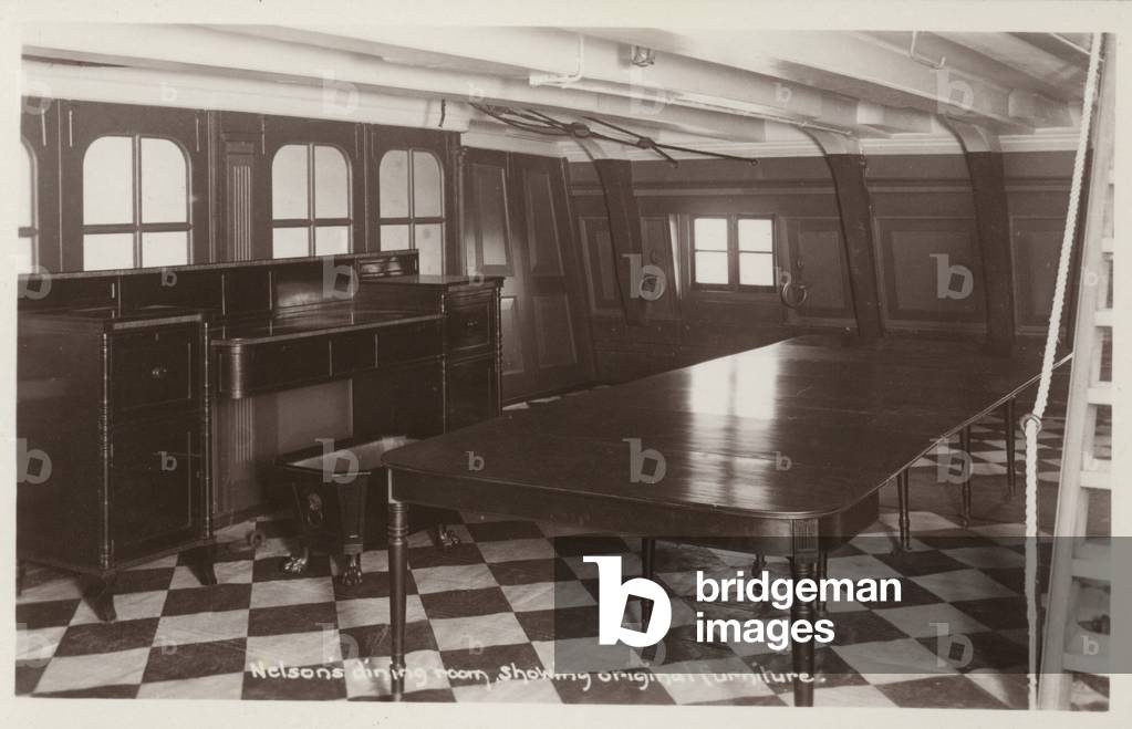 Nelson's dining room on board HMS Victory, showing original furniture (b/w photo)