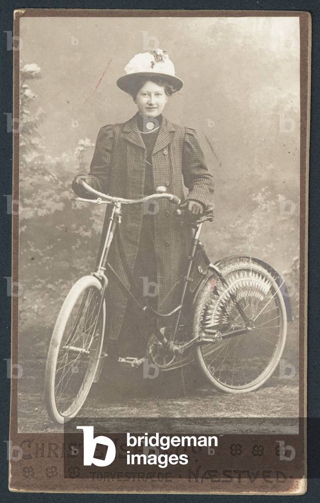 Woman with a bicycle (b/w photo)