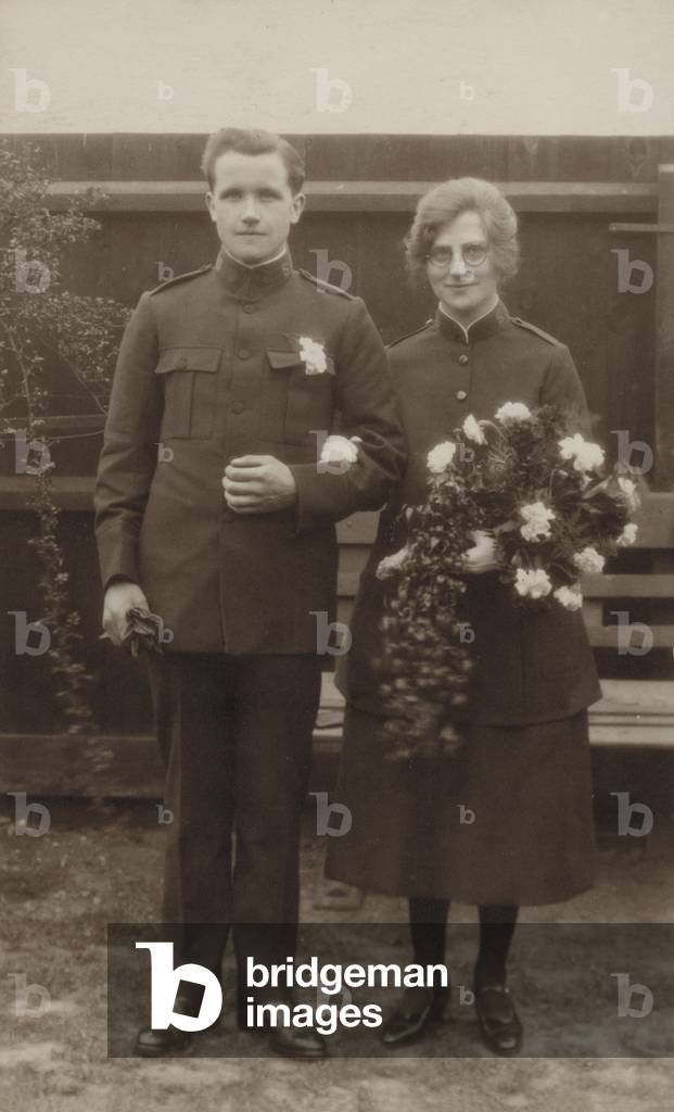 Newly married couple in Salvation Army uniforms (b/w photo)