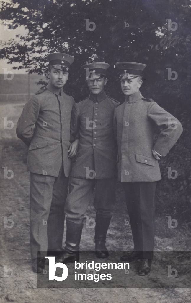 Group of three German army soldiers (b/w photo)