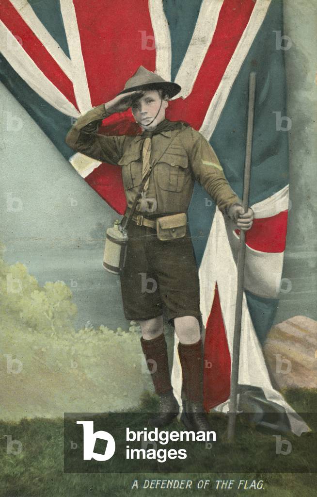 British boy scout saluting the flag (coloured photo)